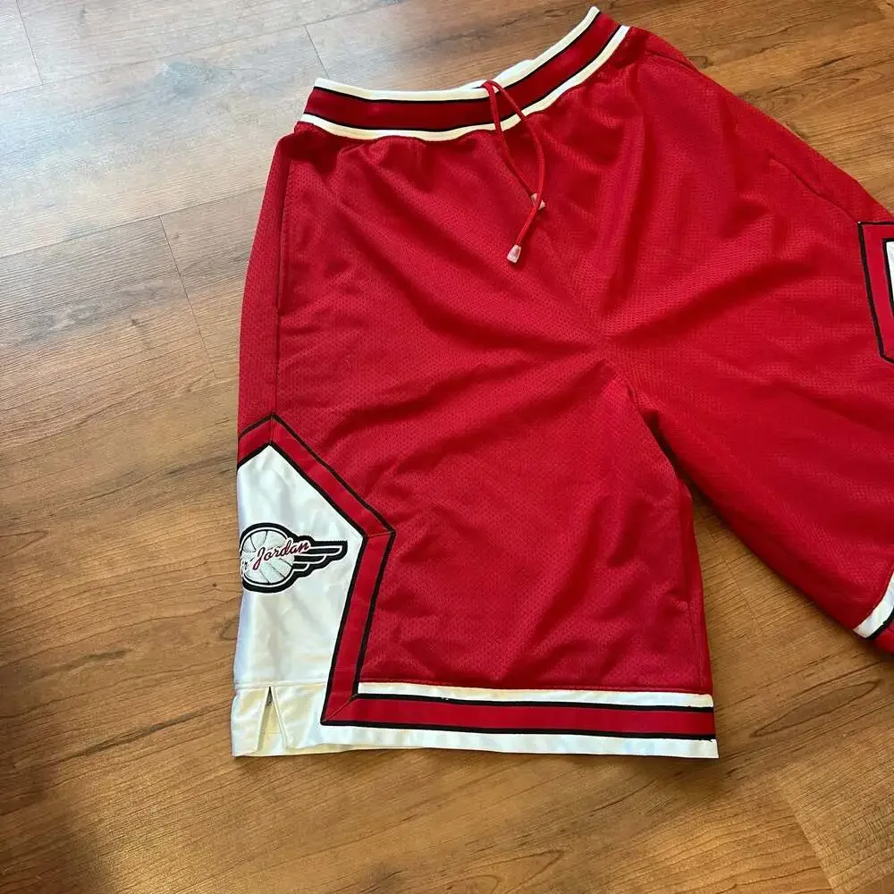 Vintage 80s/90s OG Air Jordan Wings Mesh Basketball Shorts Red & White Size L